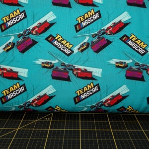 Camelot Fabrics. NASCAR. Nascar Tracks Teal