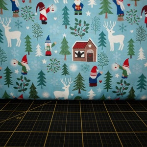 Lewis & Irene. Hygge Glow. Tomten Forest on Winter Blue Glow in the Dark