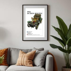 May include: Framed vintage car poster featuring a 1904 De Dion-Bouton automobile. The artwork showcases a green and gold car with detailed mechanical components. Text includes the car's name and specifications. The poster is displayed on a white background.