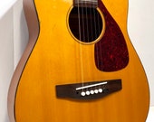 Vintage 1990s Yamaha nashville tuned alto guitar with shubb capo