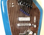 Vintage NOS Guitar to Keytar Converter lets you play guitar like a piano WTF