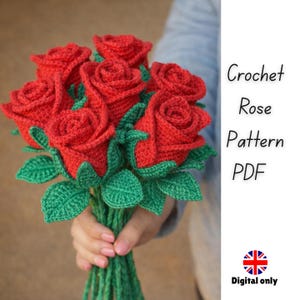 May include: A bouquet of six handmade red crochet roses with green leaves and stems. The image includes the text "Crochet Rose Pattern PDF" and a small British flag icon, indicating a digital pattern.