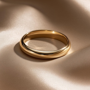 Handgefertigter, 1,5 mm – 7 mm breiter Ehering aus massivem Gold mit gewölbter Form: Klassisch polierter Ring in 9K, 14K und 18K.