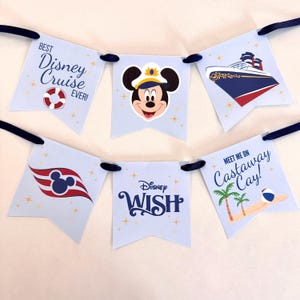 May include: A light blue banner with navy blue ribbon features Disney-themed graphics and text. The banner includes images of Mickey Mouse, a cruise ship, and the text "Best Disney Cruise Ever!" and "Meet Me On Castaway Cay!"