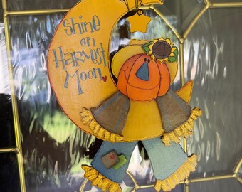 Letrero de espantapájaros de calabaza "Brilla en la luna de la cosecha"