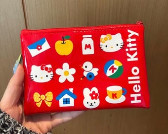 Hello Kitty Glossy Zipper Pouch – Cute Shiny Finish, 10 × 15 cm