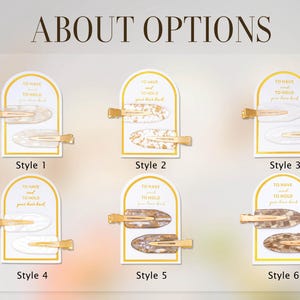 May include: A selection of six hair clips, each with a gold-coloured metal clasp and an oval decorative element. The display includes the text "ABOUT OPTIONS" and "TO HAVE and TO HOLD your hair back."