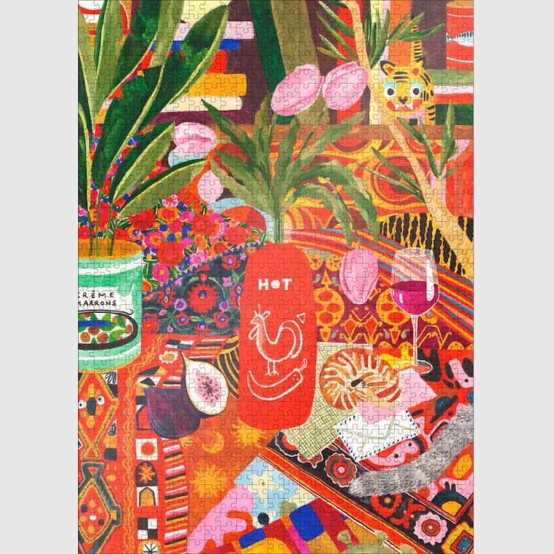 May include: A colorful jigsaw puzzle featuring a vibrant still life scene. The image includes a red hot sauce bottle with a rooster illustration, a glass of red wine, and various fruits and plants. The puzzle has a variety of patterns and colors.