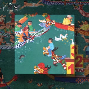 May include: A colorful jigsaw puzzle featuring a vibrant illustration of a dragon boat race. The artwork depicts people in dragon boats, with a focus on the detailed dragon heads and the lively water scene. The puzzle includes the numbers 1 and 2.
