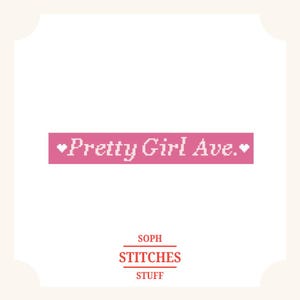 May include: A pink rectangular design with the text "Pretty Girl Ave." in white, with a heart on each end. Below, the text "SOPH STITCHES STUFF" is displayed in a stacked format, in a red font.