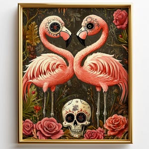 May include: A framed art print featuring two pink flamingos with decorative eye markings, facing each other. A skull with floral designs is centered below them, surrounded by red roses and foliage. The artwork is set against a dark background.