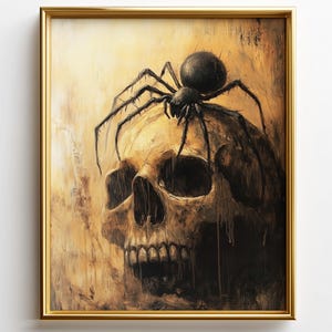 May include: A framed artwork featuring a detailed skull with a large black spider perched on top. The painting has a dark, gothic aesthetic with a gold frame. The skull is painted in shades of brown and tan.
