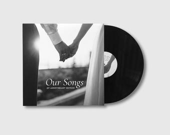 May include: Black and white vinyl record with a cover featuring two people holding hands. The album cover reads "Our Songs 1st Anniversary Edition."