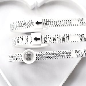 Ring Sizer. UK, US & Euro Ring Measures. Wedding Ring Measure Gauge. Ring Size Chart. Ring Measure Guide. How to Measure Ring Size Help