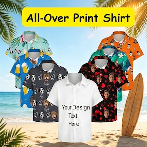 May include: A collection of short-sleeved button-down shirts featuring various patterns including beer mugs, dog faces, hearts with faces, and Halloween motifs. One central white shirt displays the text Your Design Text Here.
