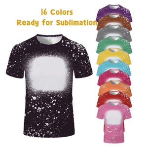 May include: A black t-shirt with a white bleached square in the center and white splatter design. The image also shows 16 different colored t-shirts, including purple, brown, gray, green, yellow, blue, pink, orange, red, and pink.