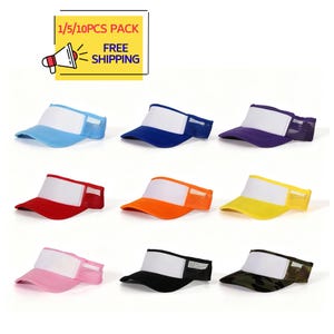 Puede incluir: Una colección de viseras en varios colores, incluyendo azul, rojo, naranja, amarillo, rosa, negro y camuflaje. Cada visera tiene un panel frontal blanco y una parte trasera de malla. La imagen también incluye el texto "1/5/10PCS PACK" y "FREE SHIPPING".
