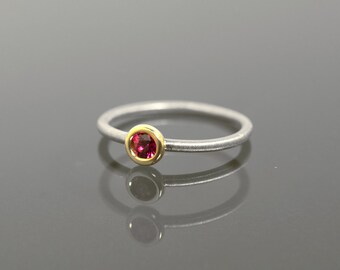 Ruby and 18K gold ring