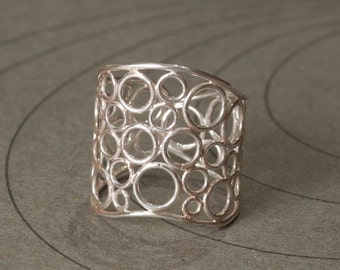 Sterling silver wide ring with little circles size 7