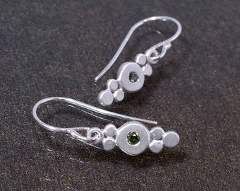 Silver earrings with green sapphires