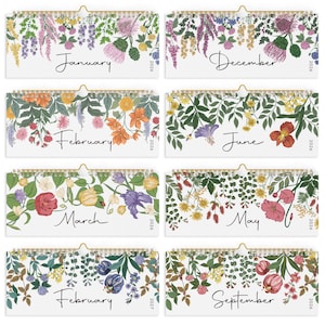 May include: A 2026 and 2027 wall calendar set featuring eight pages with spiral gold binding. Each page displays a month name in black script, the year, and a unique botanical illustration of colorful flowers and green foliage on a white background.