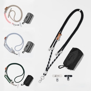 May include: A collection of dog leashes and accessories in various colors. The leashes are made of braided rope and include a matching bag for waste. The leashes are in shades of black, green, gray, and pink. The accessories include a carabiner clip and a small tag.