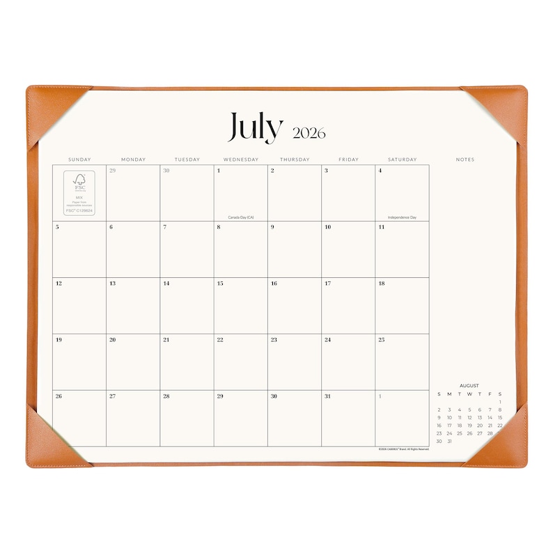 May include: A desk calendar for July 2026 featuring a white page with black text and grid lines, held in place by tan leather-like corner protectors. The calendar includes a notes column and a small August 2026 reference calendar at the bottom right.