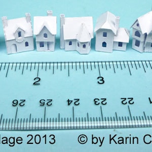 Micro Tiny Village 2013, pre-cut kit to make 8 miniature cardstock buildings. 3 color choices