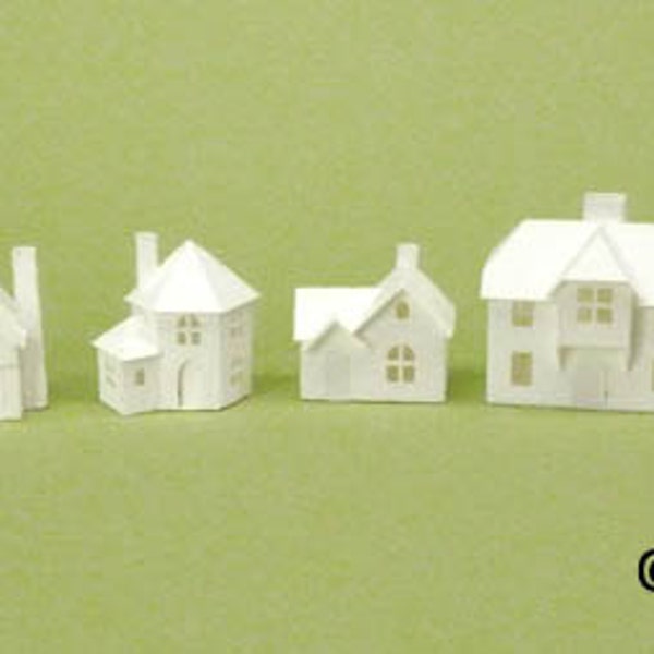 Tiny Village 2015, pre-cut kit to make 8 miniature cardstock buildings. 3 color choices