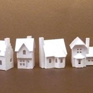 Tiny Village 2013, pre-cut  kit to make 8 miniature cardstock buildings, 3 color choices, white, gingerbread brown and black