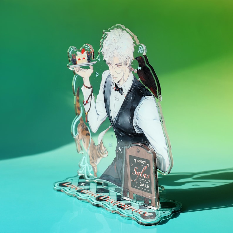 May include: Acrylic figure featuring a manga-style character in a waiter's uniform, holding a cake. A black bird perches on the character's shoulder. The figure has a small sign that reads "Today! Sylus SALE". The base reads "Love and Deep Space".