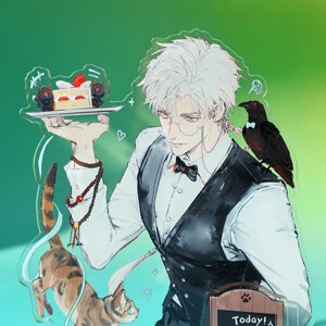May include: Acrylic stand featuring an anime-style illustration of a waiter holding a cake on a tray, with a raven on his shoulder and a cat at his feet. The waiter wears a vest, bow tie, and glasses. The background is a gradient of green.