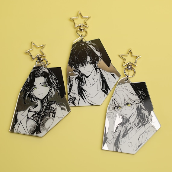 Reverse: 1999 Enigma Lucy Medicine Pocket Acrylic Keychain