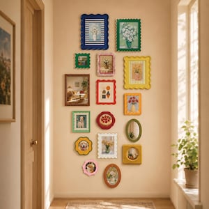 May include: A gallery wall arrangement featuring a collection of various picture frames in diverse shapes, sizes, and colors, including scalloped, oval, and rectangular designs, displaying assorted floral art, animal portraits, and mirrors.