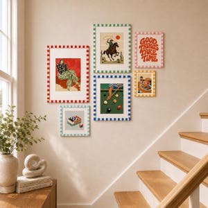May include: A gallery wall arrangement featuring five framed art prints with colorful checkered borders. The prints depict a seated figure, a cowboy on horseback, the text GOOD THINGS TAKE TIME, a pool game, and a matchbox with a ball.