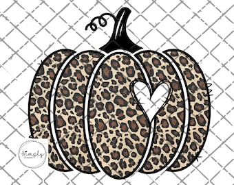 May include: A brown and black leopard print pumpkin with a white heart cut out of the center. The pumpkin has a black stem with a swirl at the top.