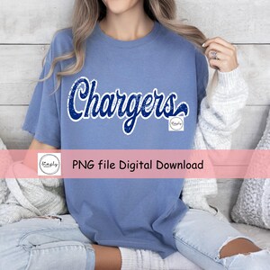 May include: A pale blue t-shirt featuring the word "Chargers" in a distressed navy blue font. The shirt also has a small logo and the text "PNG file Digital Download".