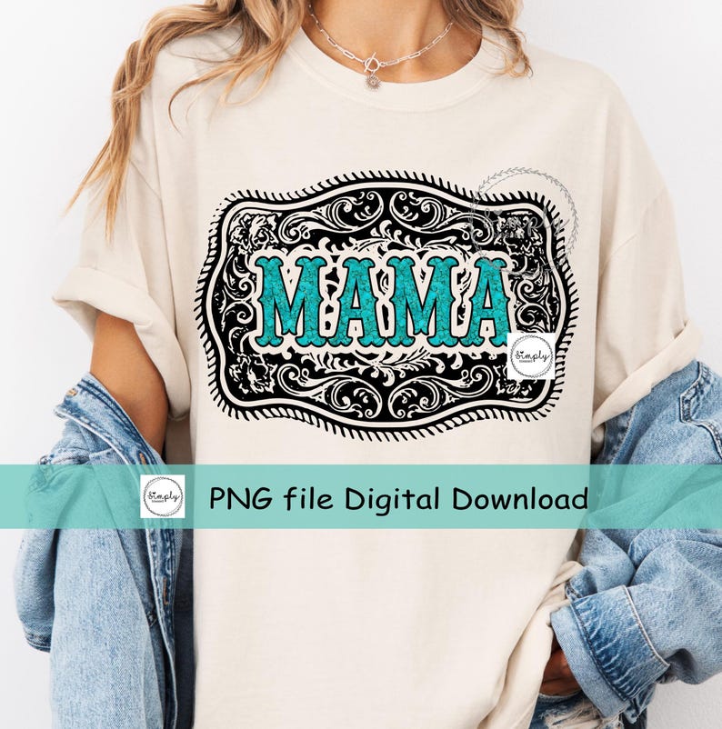 May include: A white t-shirt with a black and white graphic of a turquoise blue "MAMA" word inside a decorative western-style belt buckle.