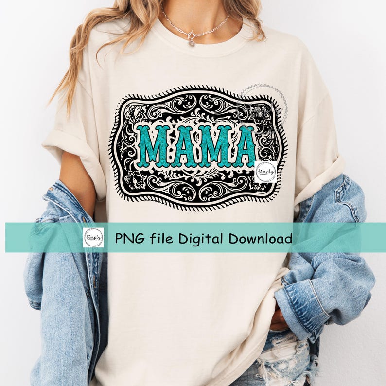 May include: A white t-shirt with a black and white design of a belt buckle with the word "MAMA" in turquoise lettering.