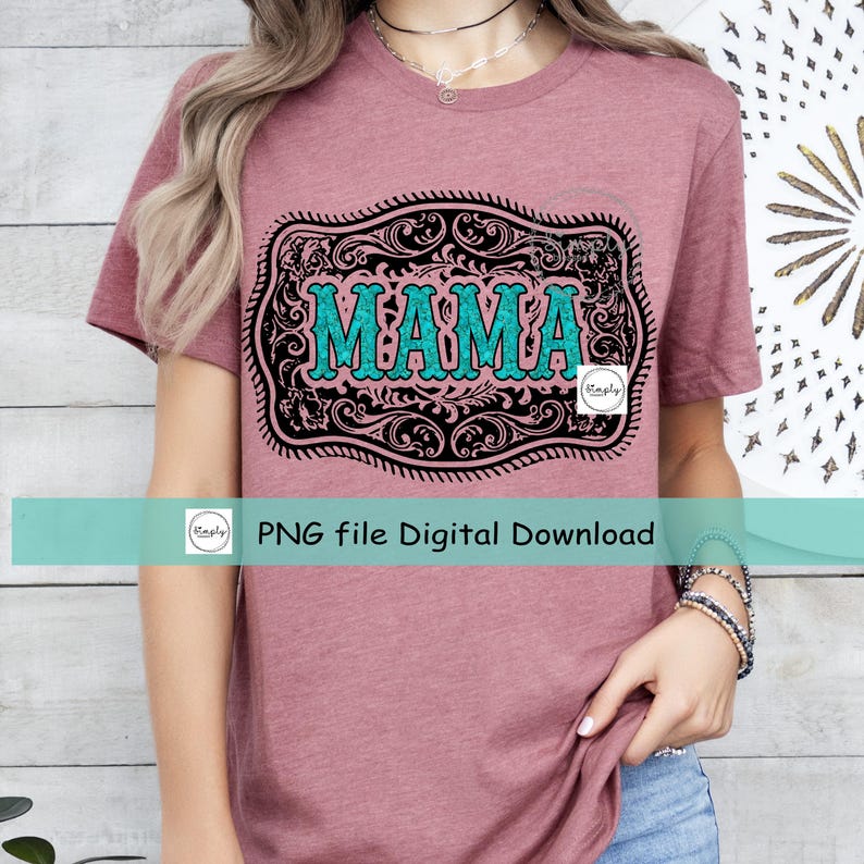 May include: A pink t-shirt with a black and white ornate design featuring the word "MAMA" in turquoise glitter.