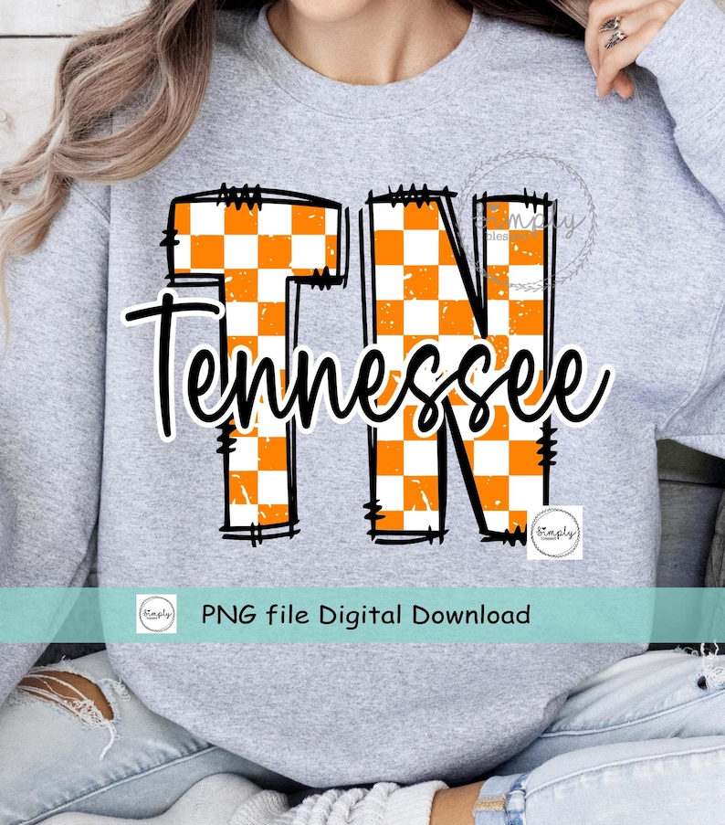 May include: A gray sweatshirt featuring the word "Tennessee" in a cursive font, with the letters "TN" in a checkered orange and white pattern. The sweatshirt also includes the text "PNG file Digital Download".