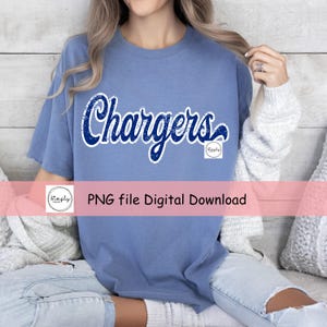 May include: A light blue t-shirt featuring the word "Chargers" in a distressed navy blue font. The shirt also has the text "PNG file Digital Download" in a pink banner.