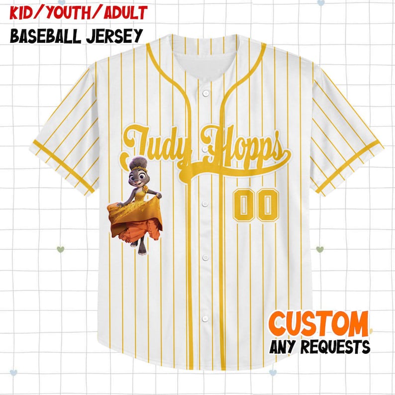 May include: White baseball jersey with yellow pinstripes and accents. Features the name "Judy Hopps" in yellow script, the number "00", and a cartoon character graphic. The jersey has the text "CUSTOM ANY REQUESTS" at the bottom.