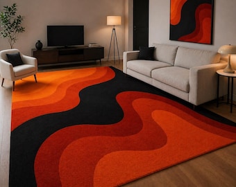 Abstracte oranje-zwarte vloerkleed, modern golvend design, handgemaakt getuft vloerkleed
