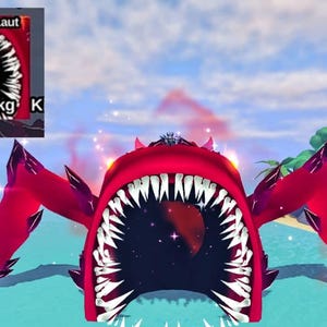 May include: A red, cartoonish sea monster with a large mouth filled with sharp white teeth. The monster has large, wing-like appendages and a dark interior. A small box in the upper left corner has text in a foreign language and the weight of the monster.