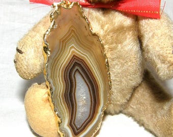 Exclusive large pendant with agate disc, gold-plated border, vintage 1970s.