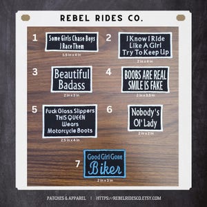 May include: Collection of embroidered patches with various phrases, including "Some Girls Chase Boys I Race Them" (1.5 x 4 in), "Beautiful Badass" (2 x 3 in), and "Good Girl Gone Biker" (2 x 3 in). The patches are black with white or blue text.