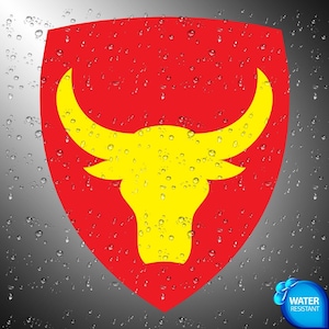 May include: A red shield-shaped emblem featuring a yellow bull head silhouette in the center. The design is overlaid with a water droplet effect and includes a small blue circular badge in the bottom right corner with the text WATER RESISTANT.