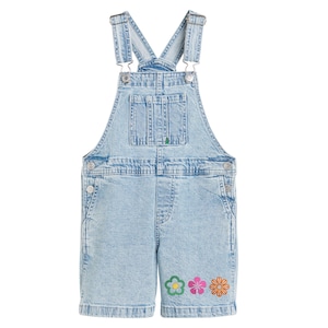 May include: Light blue denim overall shorts with adjustable straps and a front bib pocket. The shorts feature three embroidered flowers in green, pink, and orange near the hem. The garment is made of a light wash denim.