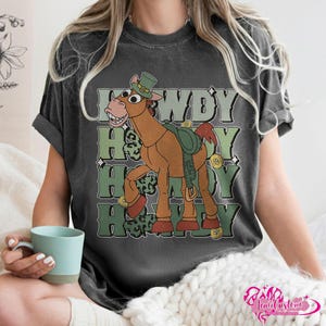 May include: A rustic wooden sign with the text "Welcome to our home" in white lettering. The sign features a distressed finish and a simple, inviting design, perfect for a front porch or entryway.